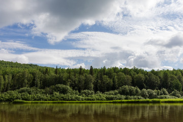Fototapeta na wymiar Shores of small river. Krasnoyarsk region, Russia 