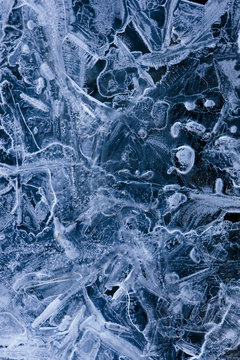 Background of frozen ice crystals formed due to dropping temperatures.