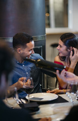 friends toasting with wine