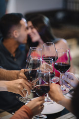 friends toasting with wine