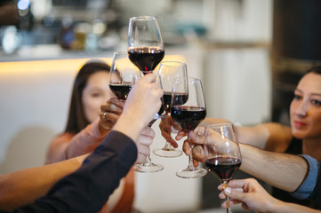 friends toasting with wine