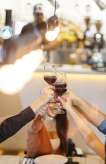friends toasting with wine