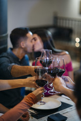 friends toasting with wine