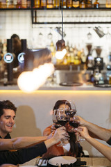 friends toasting with wine