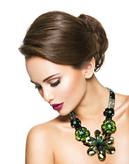  beautiful woman with fashionable green jewelry