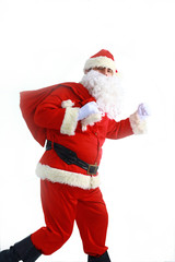 Santa Claus running with the bag of the presents