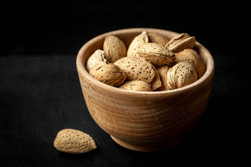 Almonds in a wooden bowl.