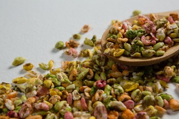 Breakfast cereals scattered from spoon