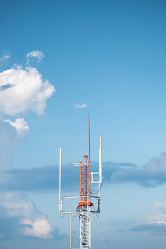 Radio antenna with blue sky