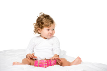 toddler girl with wrapped present