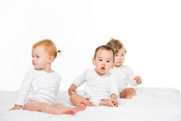 multiethnic toddler boy and girls