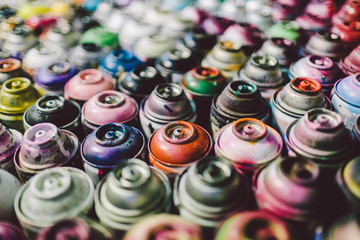 A group of colorful spray aerosol cans. Great use for art concept and background