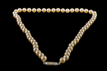 Antique Ladies String of Pearls Isolated on Black background