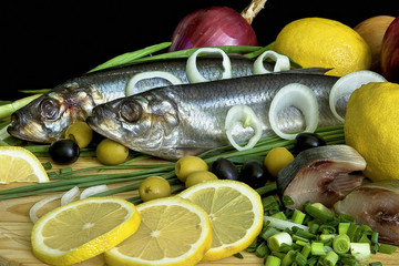 still life with herring and lemon