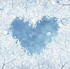 Winter Christmas background. Heart-shaped pattern