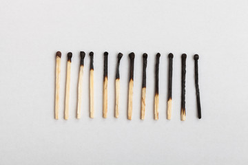 Matches forming sequence on slightly gray background