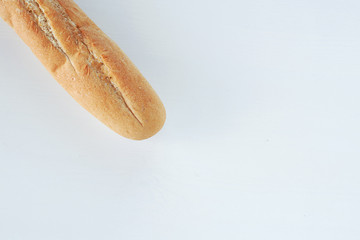 French bread baguette on a table white background