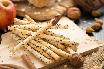cinnamon bread Crispy twist pies. with a chocolate butter and red apple