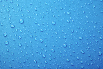 Plakat water drops on blue background