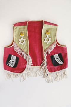 overhead view of a vintage child's cowboy dress up outfits