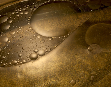 closeup macro of the intermixing of oil and water