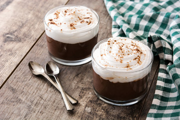 Chocolate mousse on wooden table