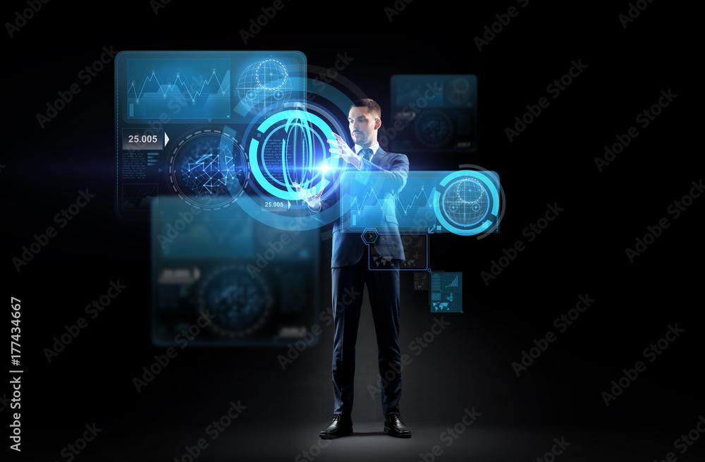 Wall mural businessman working with charts on virtual screen