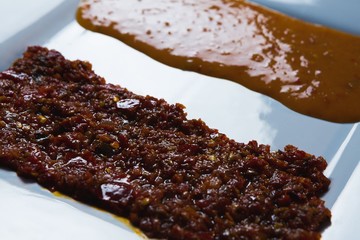 Sauce and chutney in a tray