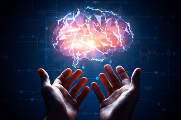 Hands holding artificial brain