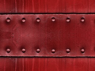 Red metal plate background.