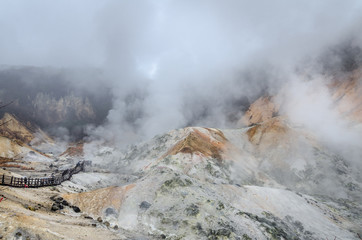 Beautiful valley of Jigokudani or "Hell Valley", located just above the town of Noboribetsu Onsen, which displays hot steam vents. It is a main source of Noboribetsu's hot spring waters.