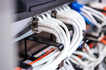 Closeup of network cables were connected to hub or router.