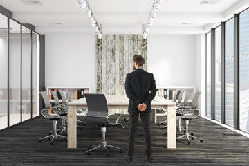 Handsome businessman in meeting room