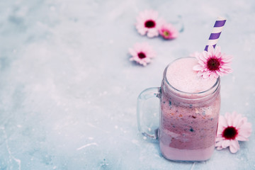 Healthy smoothie in a glass bottle