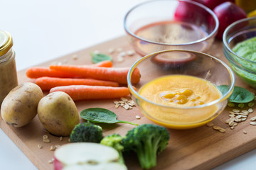 vegetable puree or baby food in glass bowls