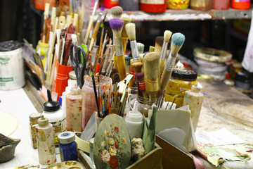 Brushes and paint in the artist's Studio