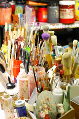 brushes and paint in the artist's Studio