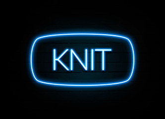 Knit  - colorful Neon Sign on brickwall