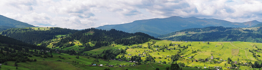 Fototapeta na wymiar Panorama of the villiage at the karpatian mountains