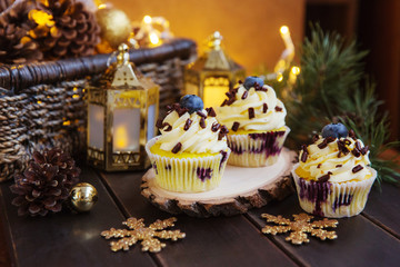 Christmas cupcakes with lights dark background