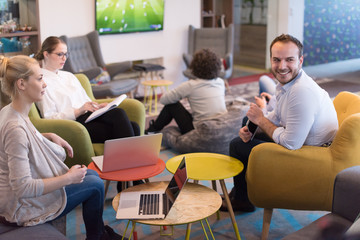 Startup Business Team At A Meeting at modern office building