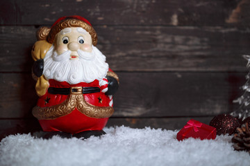 Santa Claus with snow Christmas decoration.