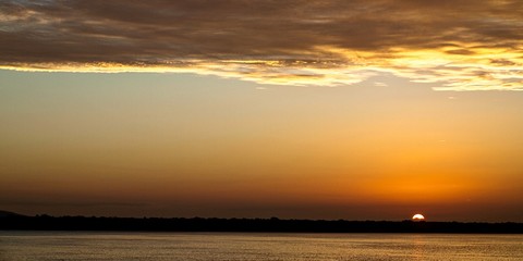 Vivid Yellow Cloud Orange Sky Sunrise Seascape Australia.