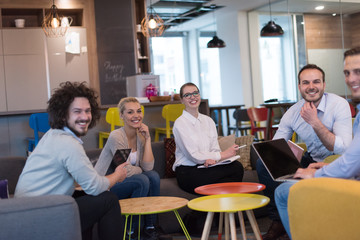 Startup Business Team At A Meeting at modern office building