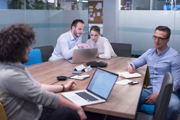 Startup Business Team At A Meeting at modern office building