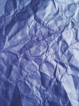 Close up of crumpled piece of colorful construction paper