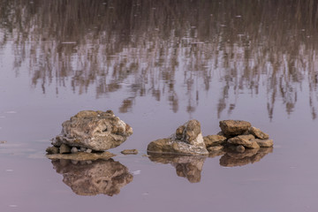 Mound of stones in the pink lake of Torrevieja