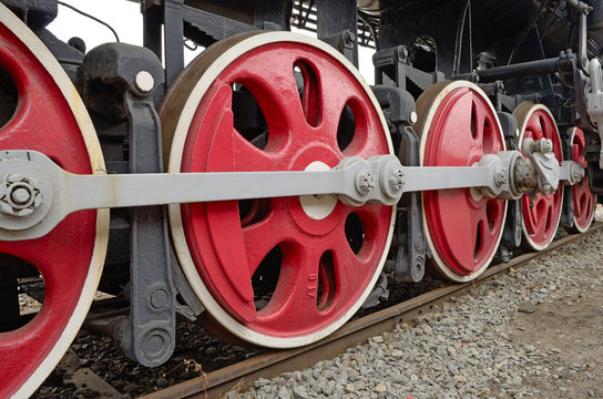 The iron wheels of the train.