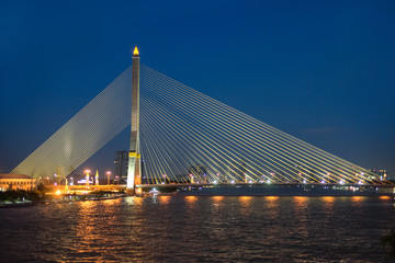 Fototapeta na wymiar Rama VIII bridge over Chao Phraya River in the evening - Bangkok, Thailand