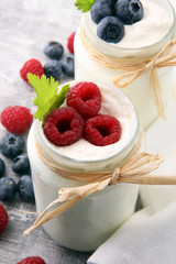 Fresh Yogurt. Breakfast with yogurt and blueberries and raspberrries